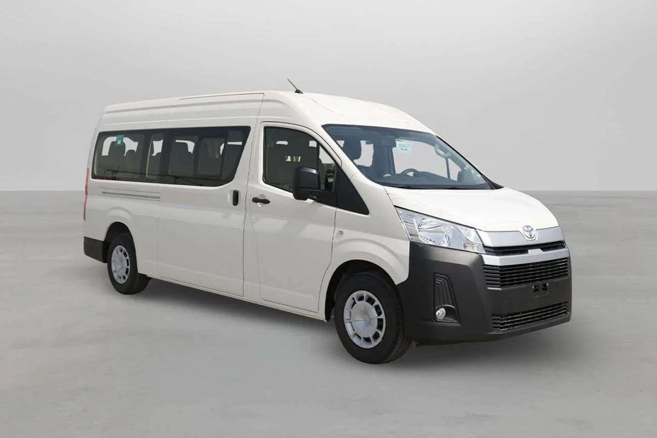 White Toyota HiAce high-roof minibus for group travel and car rental in Ethiopia